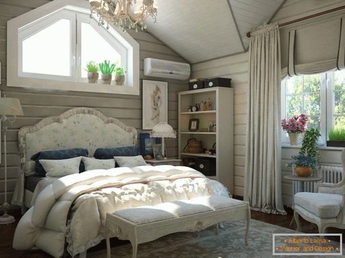 A bedroom for guests on the attic floor of a country house. Interior in the style of country looks impressive and stylish. 