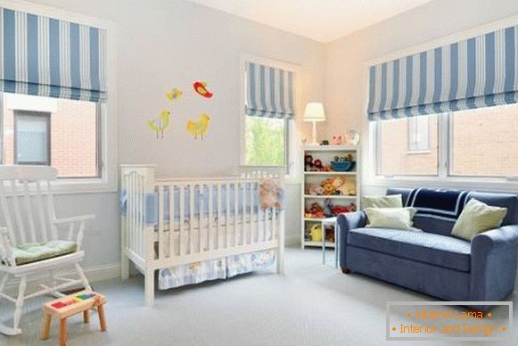 Striped Roman curtains on the windows of the nursery