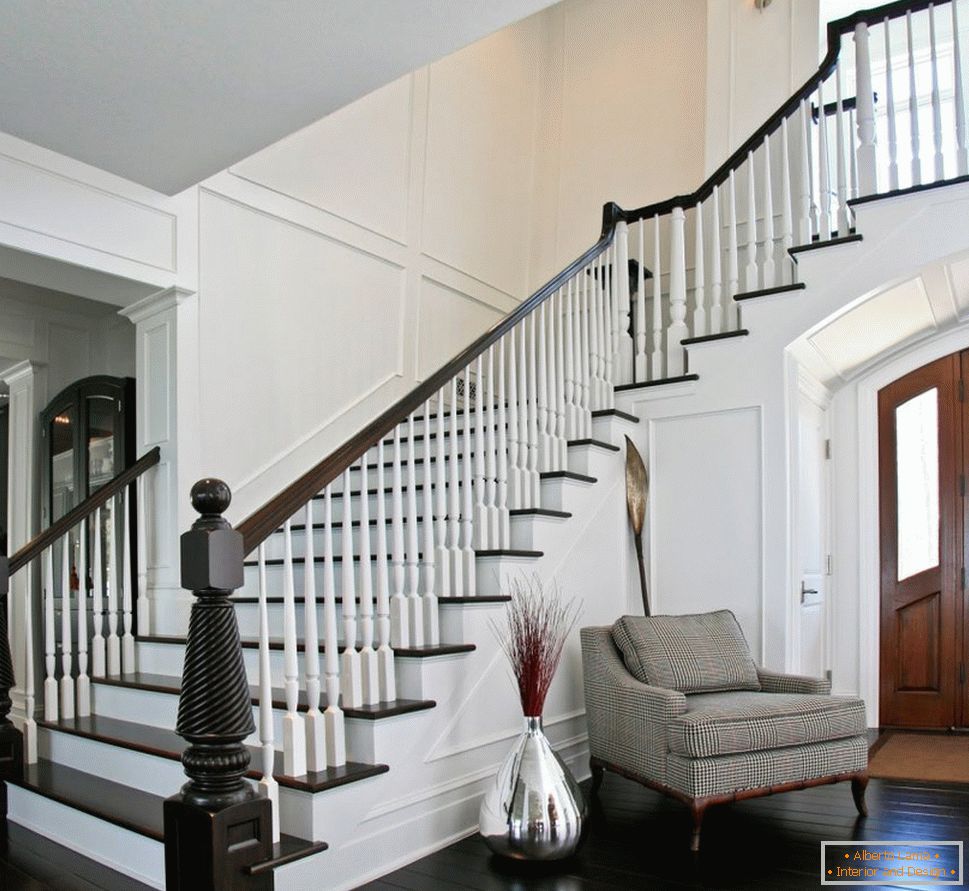 Storage area under the stairs in the design of a small room