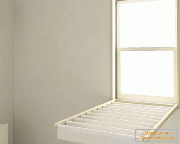 Folding towel rail