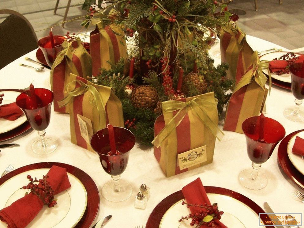 Red tableware on a white tablecloth