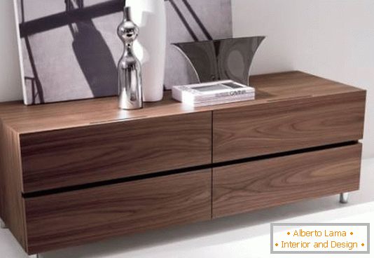 Low chest of drawers with a beautiful pattern of wood
