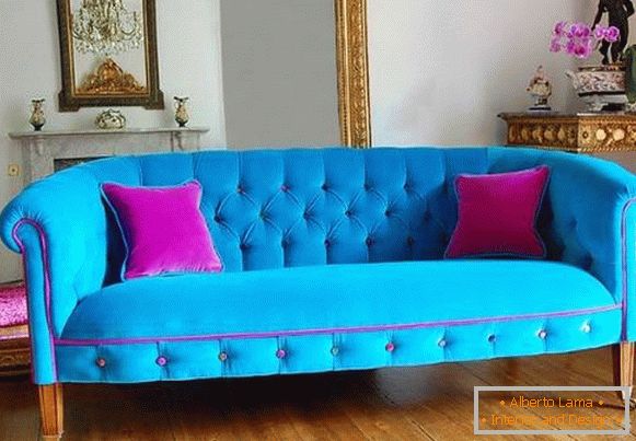 Bright blue with a pink sofa in the living room