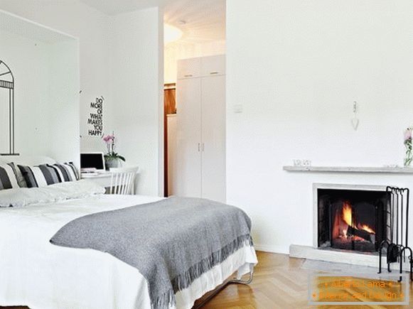 Fireplace near the bed