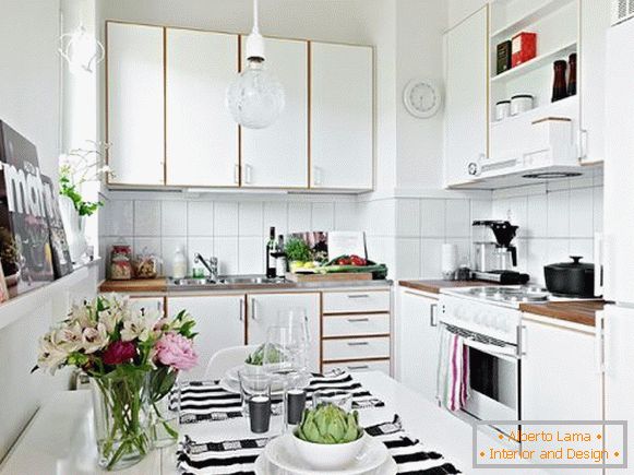 Kitchen with dining room in white color