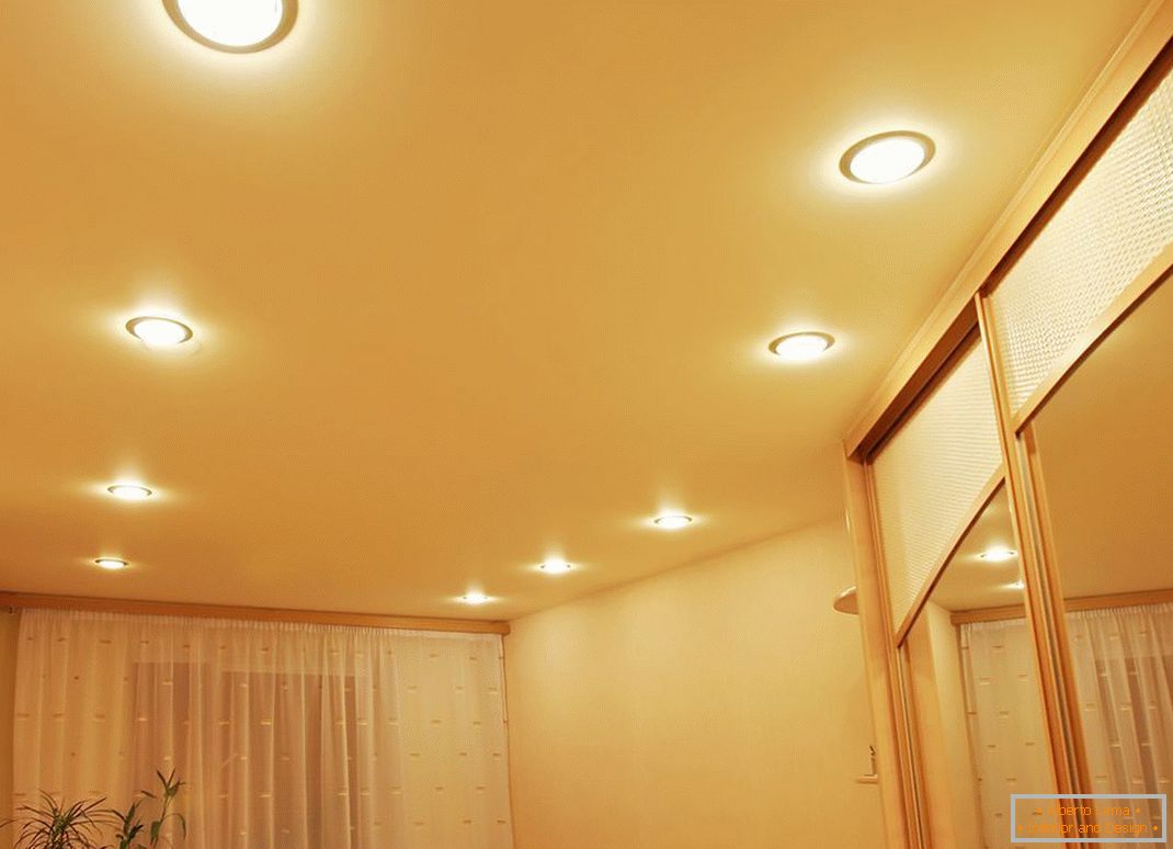 Point lighting is always advantageously combined with stretch ceilings of PVC.