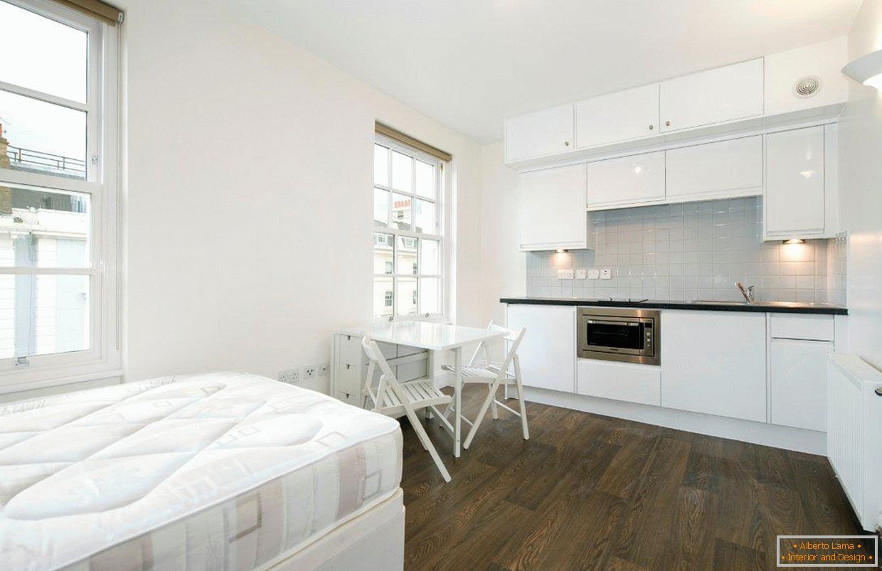 Interior of a studio apartment in a four-story Victorian house in Pimlico