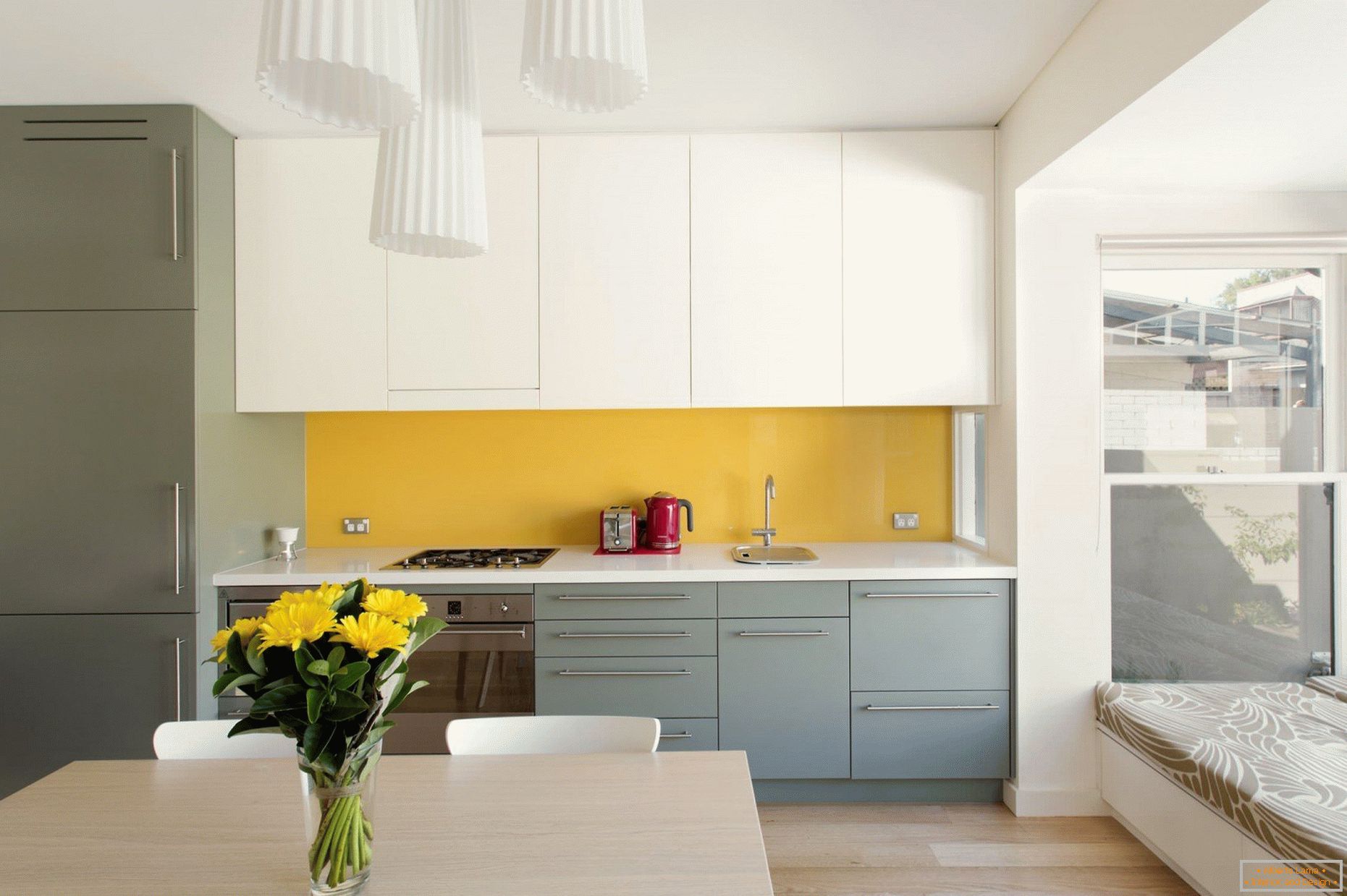 Yellow apron in white and gray kitchen