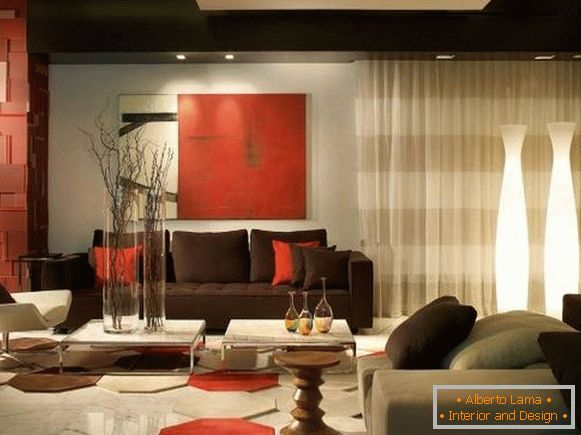 The combination of brown in the interior of the living room with red