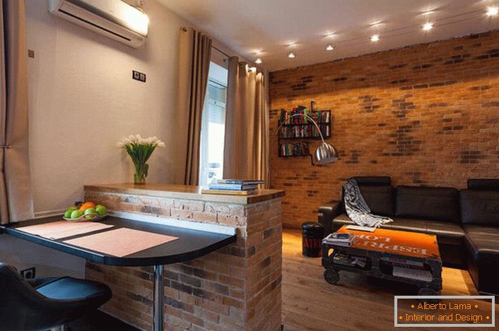 In the design of a one-room apartment in the loft style warm colors of beige are used. In a family warm interior - an unusual solution for the loft.