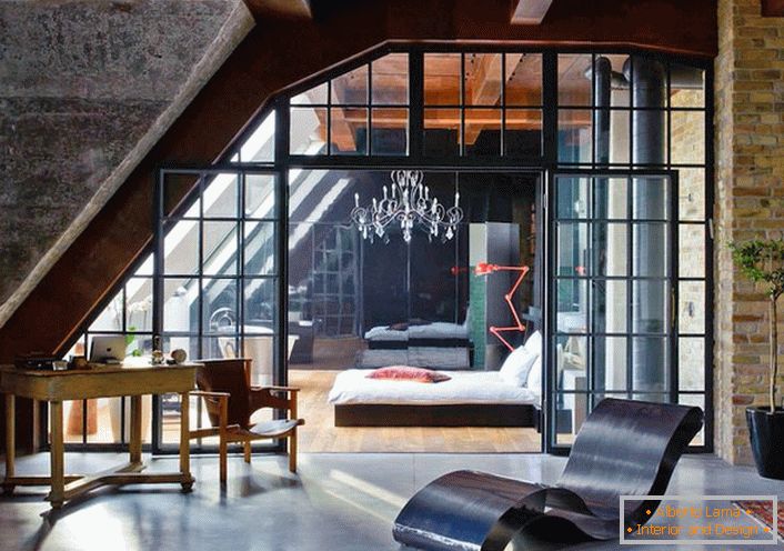 The apartment in the loft style is interesting with decorative partitions, which separate the rooms from each other. 