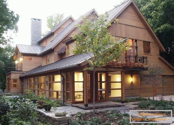 Large wooden house - photo outside with siding