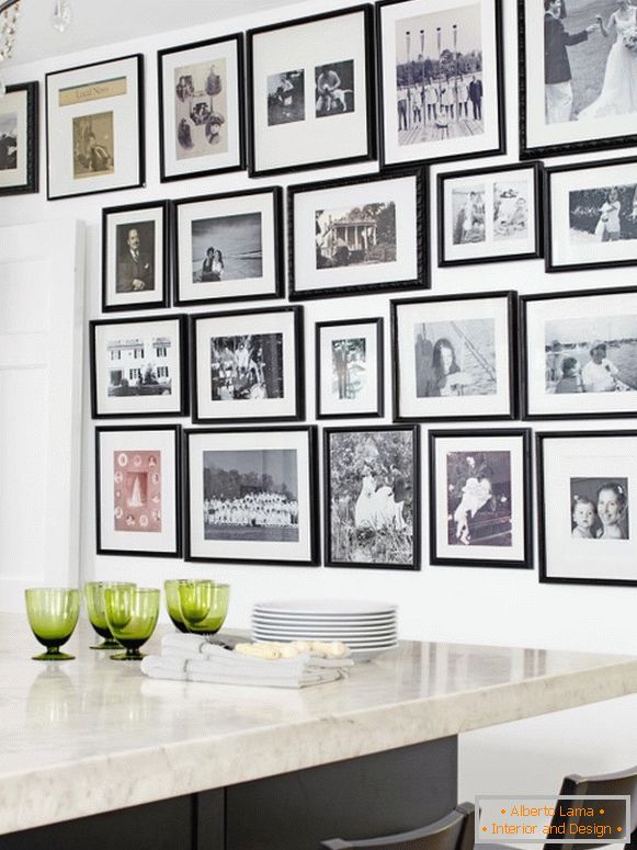Photos in black frames on the wall
