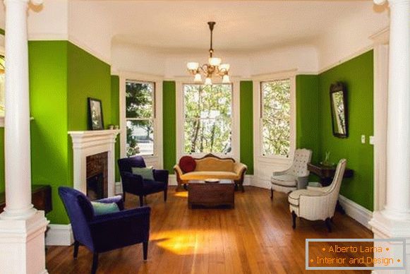 Green color of the walls in the large living room