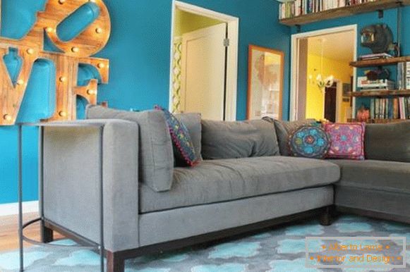 Living room with bright blue walls