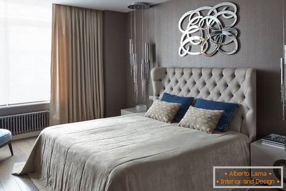 Interior design of a bedroom in a modern style with a touch of luxury