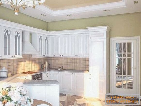 Interior of a small kitchen in a private house - white kitchen in a classic style