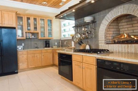 Kitchen design in a private house with a built-in stove