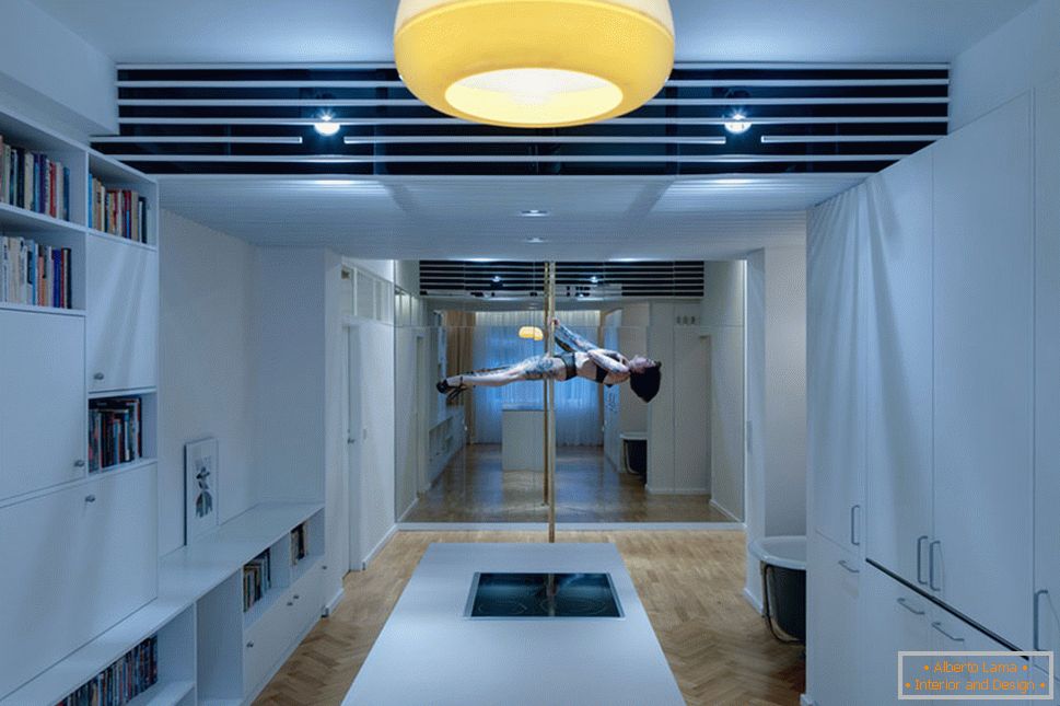 Modern design of a small apartment - a pole in the middle of the room