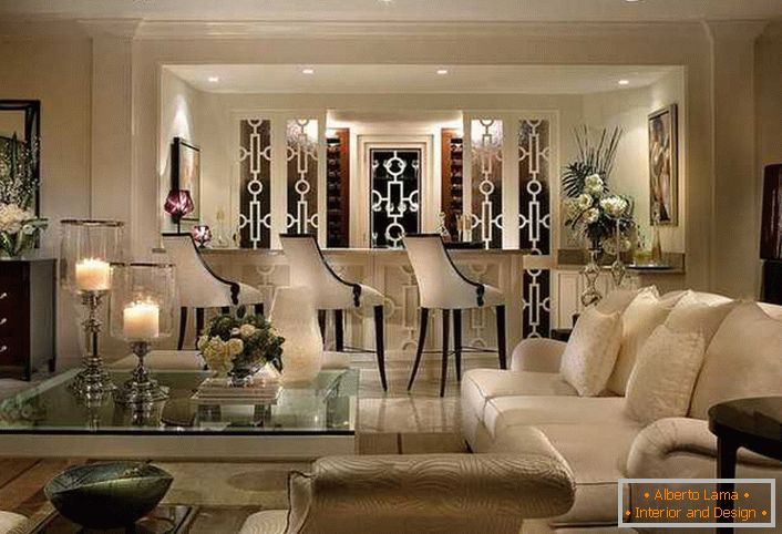 Moderately reserved style of art deco was used to decorate a large living room in a country house. Furniture of ivory color with elements of wenge wood in a single composition looks elegant and unsurpassed. 