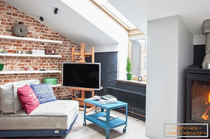 Living room in the attic studio apartment