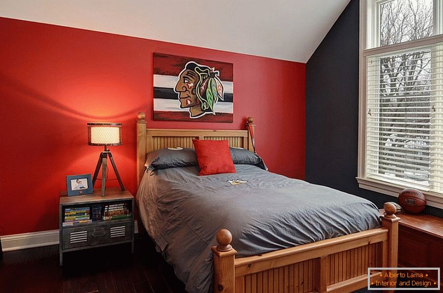 Red wall and gray bedding
