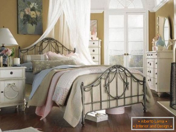 Forged bed in Provence style in the interior