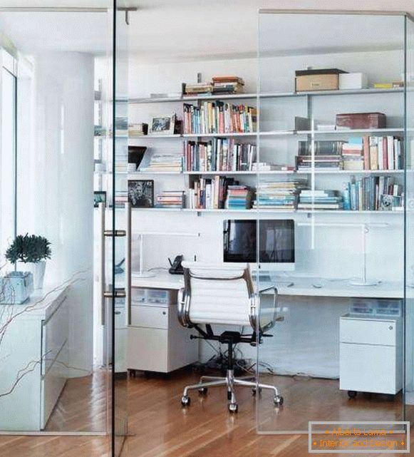 Home office behind glass partitions