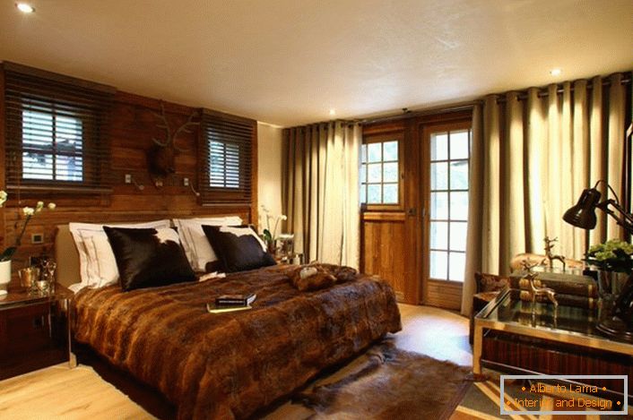 To a greater extent, a noble dark brown wood was used to decorate the bedroom.