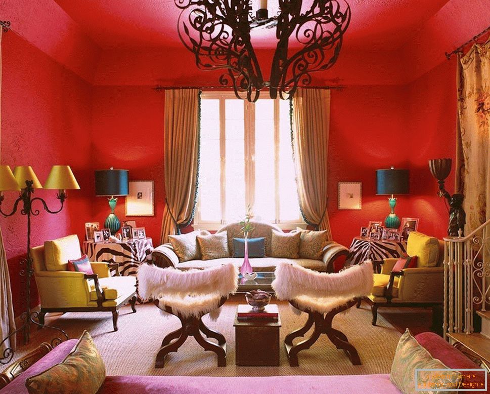 Lamps with multicolored lampshades against the background of red walls