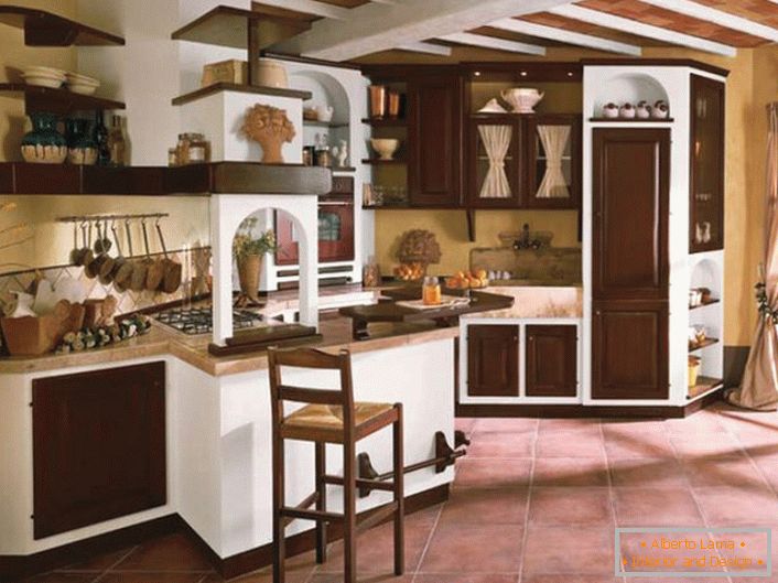 Kitchen in country style in a country house in one of the provinces of France. A spacious, bright kitchen is the dream of any mistress.