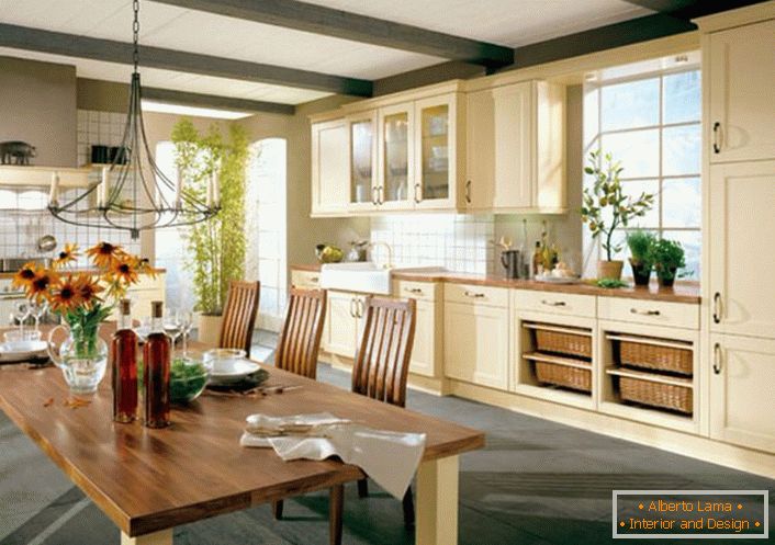 Kitchen in the style of country in the big house of a well-to-do Italian family. For country style, a kitchen set of wood in light beige tones is well chosen.