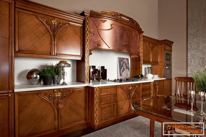A magnificent example of a kitchen set in the Art Nouveau style. Furniture made of natural wood makes the interior attractive and exquisite.