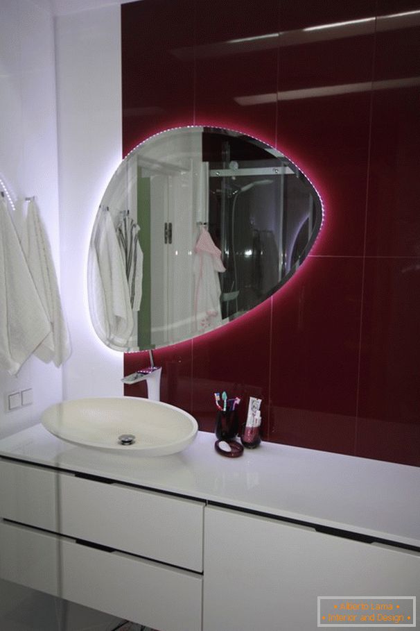 Mirror with illumination in the bathroom
