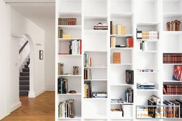White bookcase built into the wall