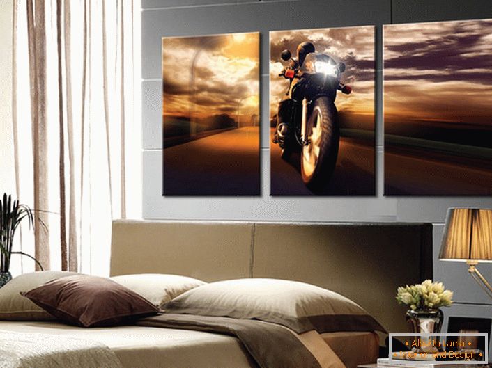 The bedroom of the young bachelor is decorated with a modular painting, on which a motorcyclist is depicted.