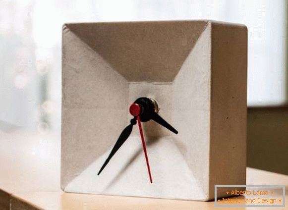 Handicrafts: a stylish clock on the table