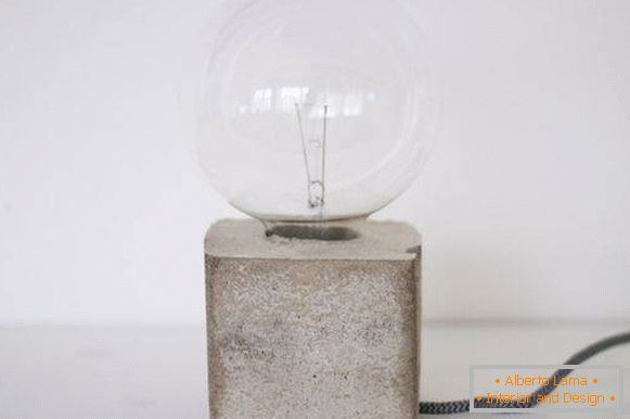 Homemade table lamp made of cement