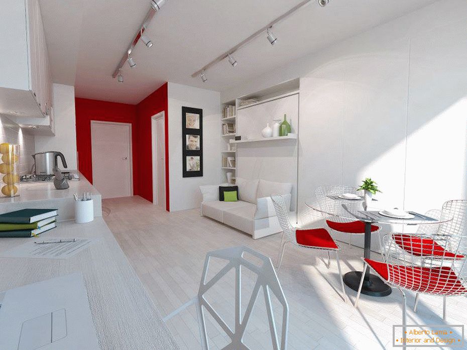White interior of a small apartment with red accents