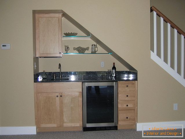 Kitchen area under the stairs