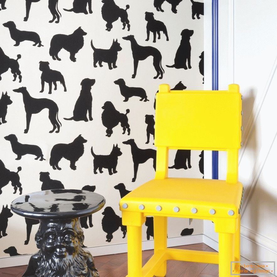 Yellow chair and black table in the corner