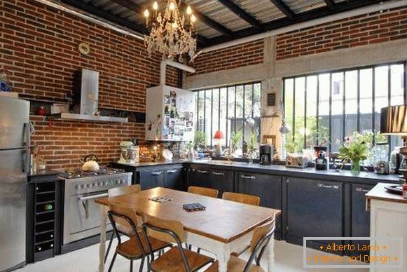 Classic chandelier in kitchen design in loft style