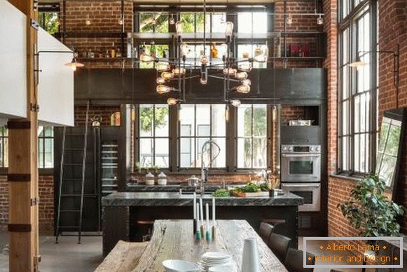 Stylish industrial chandelier in the loft style in the interior
