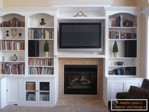Built-in wall with TV above the fireplace