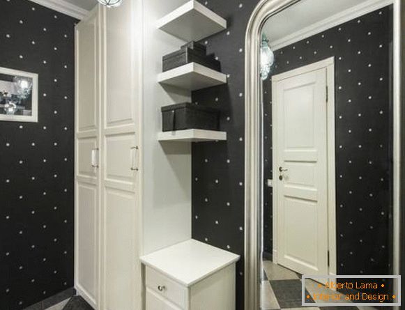 Black wallpapers in white polka dots in the hallway - photo interior