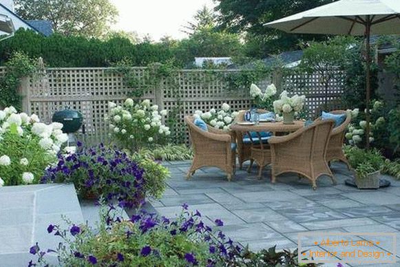 Small terrace near the house with fences