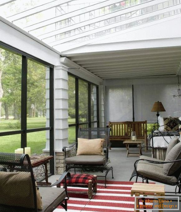 A small enclosed terrace with a transparent roof photo