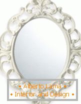 Elegant mirror in an openwork frame