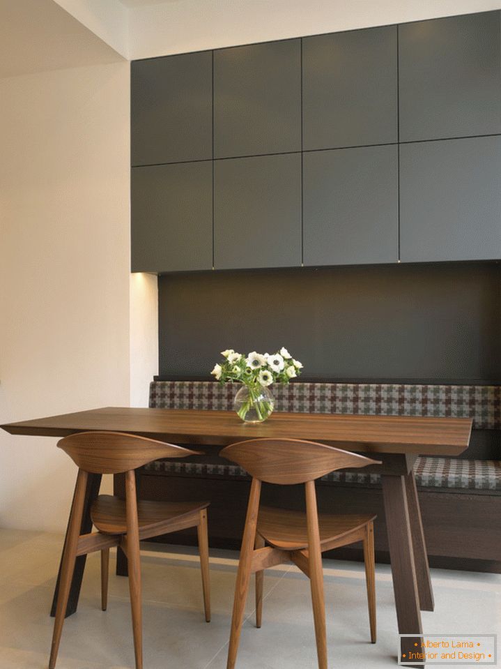 Closets with snaps above the dining area