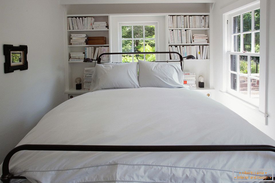 A large bed in a small bedroom